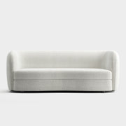 Front facing contemporary off-white metallic boucle curved kidney sofa on a white background
