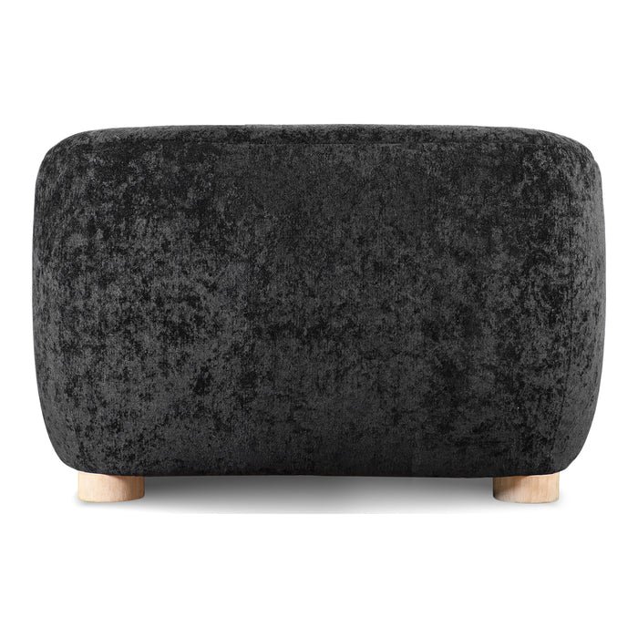 Front facing back view of a contemporary black chenille sloping tuxedo accent armchair on a white background