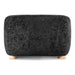 Front facing back view of a contemporary black chenille sloping tuxedo accent armchair on a white background