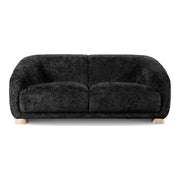 Front facing contemporary black chenille sloping tuxedo loveseat on a white background