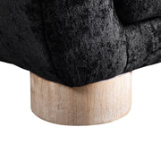 Right facing close up view of the leg on a contemporary black chenille sloping tuxedo loveseat on a white background
