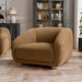 Left facing contemporary brown chenille sloping tuxedo accent armchair in a room with accessories