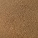 Swatch of the upholstery fabric on a contemporary brown chenille sloping tuxedo sofa