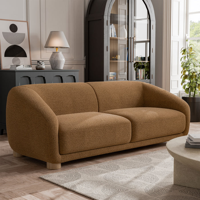 Right facing contemporary brown chenille sloping tuxedo sofa in a room with accessories