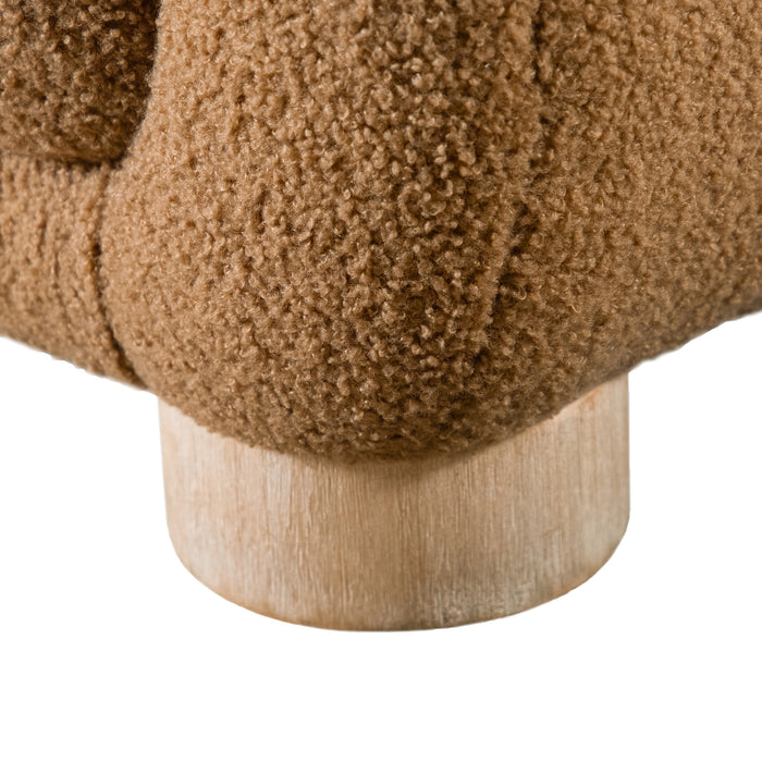 Left facing close up view of the leg on a contemporary brown chenille sloping tuxedo sofa on a white background