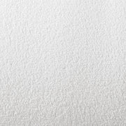 Swatch of the upholstery fabric on a contemporary brown chenille sloping tuxedo loveseat