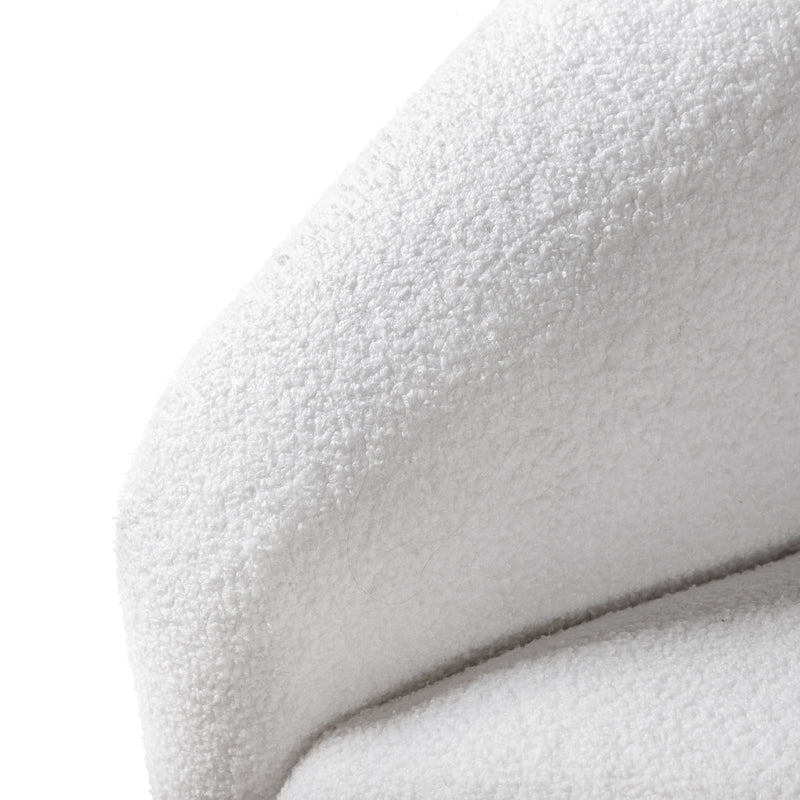 Left facing close up view of the inner armrest on a contemporary brown chenille sloping tuxedo loveseat on a white background