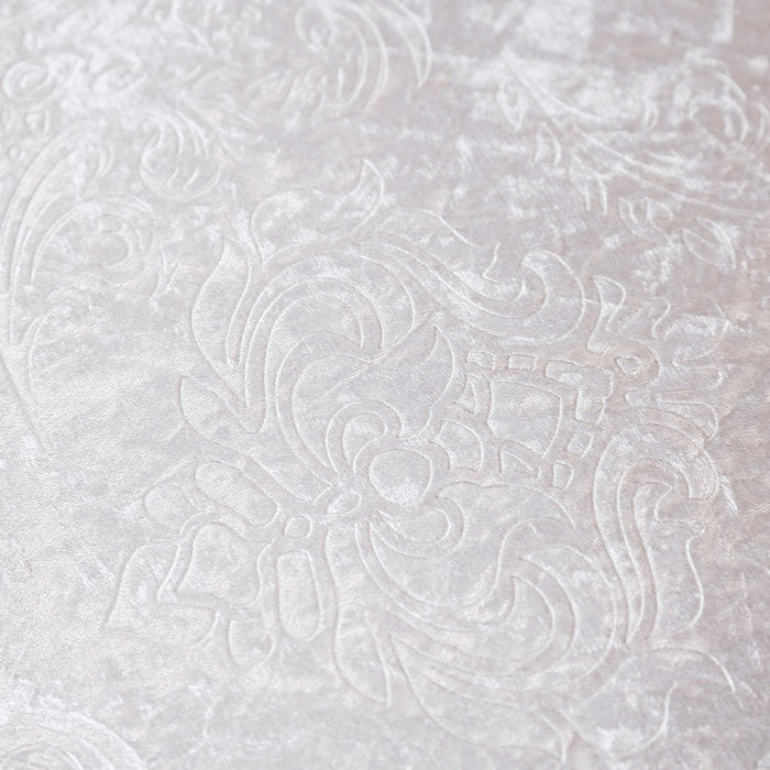 Swatch of the upholstery fabric on a contemporary white chenille trapezoidal armless chair with an adjustable back