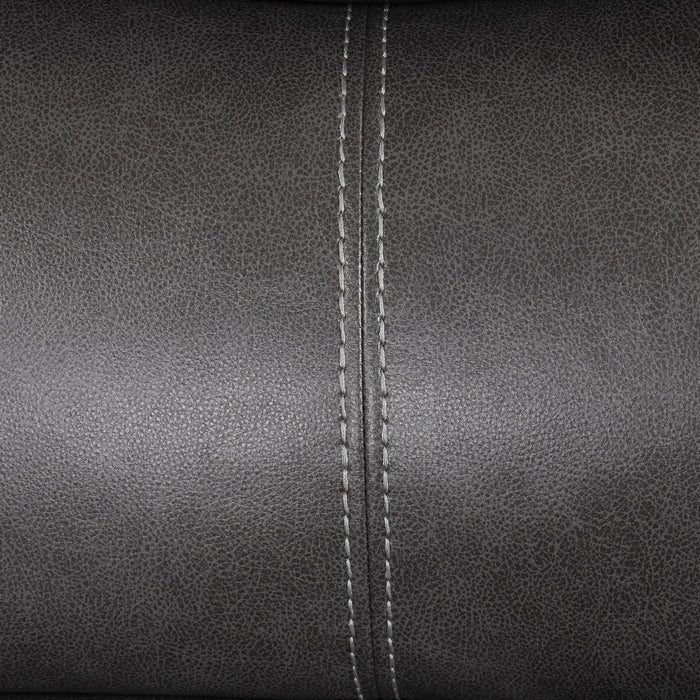 Front facing close up of the accent stitching of a transitional dark grey faux leather reclining sectional sofa with a storage console