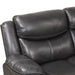 Right facing close up of the backrest and accent stitching of a transitional dark grey faux leather reclining sectional sofa with a storage console