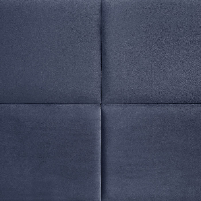 Swatch view of the upholstery and tufting on a contemporary grey upholstered full bed with attached storage bench