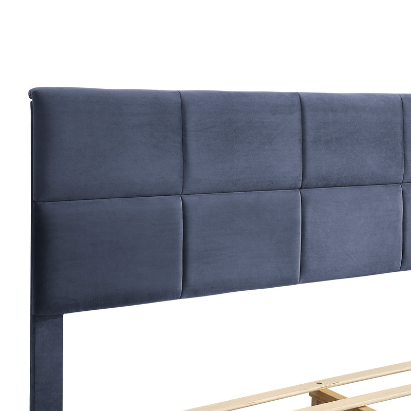 Right facing close up of the headboard on a contemporary grey upholstered full bed with attached storage bench on a white background