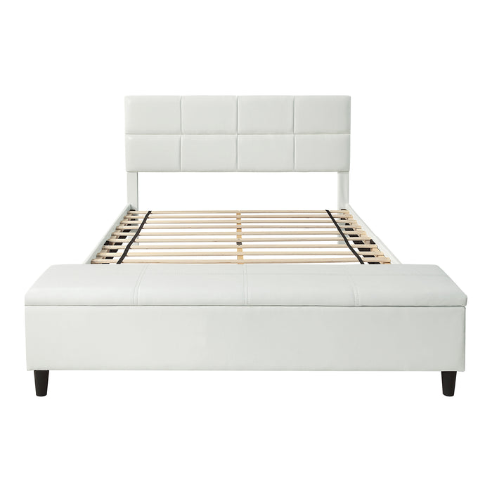 Front facing contemporary white upholstered full bed with attached storage bench on a white background