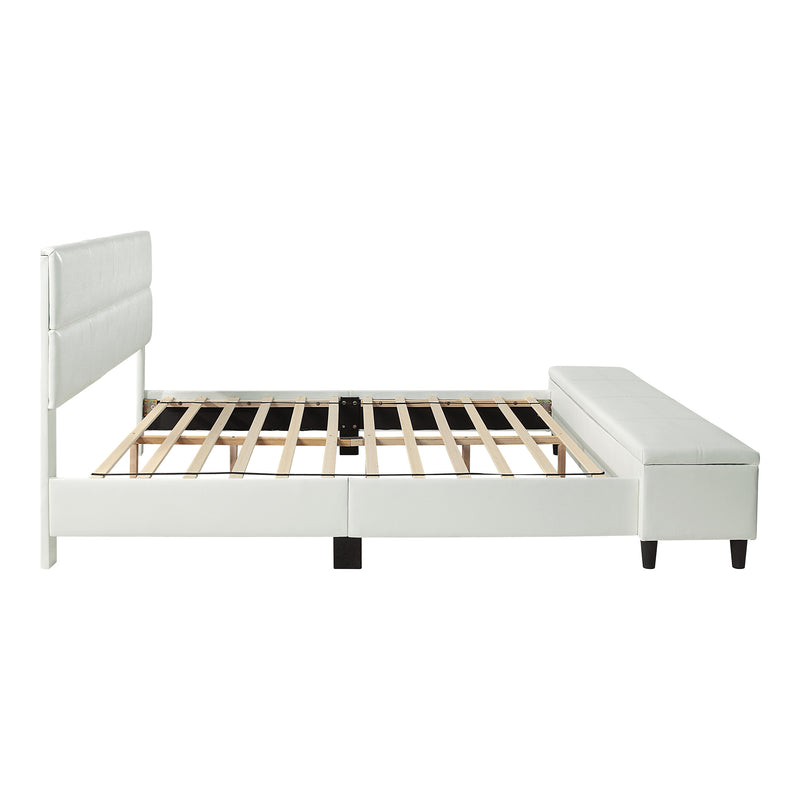 Front facing side view of a contemporary white upholstered full bed with attached storage bench on a white background