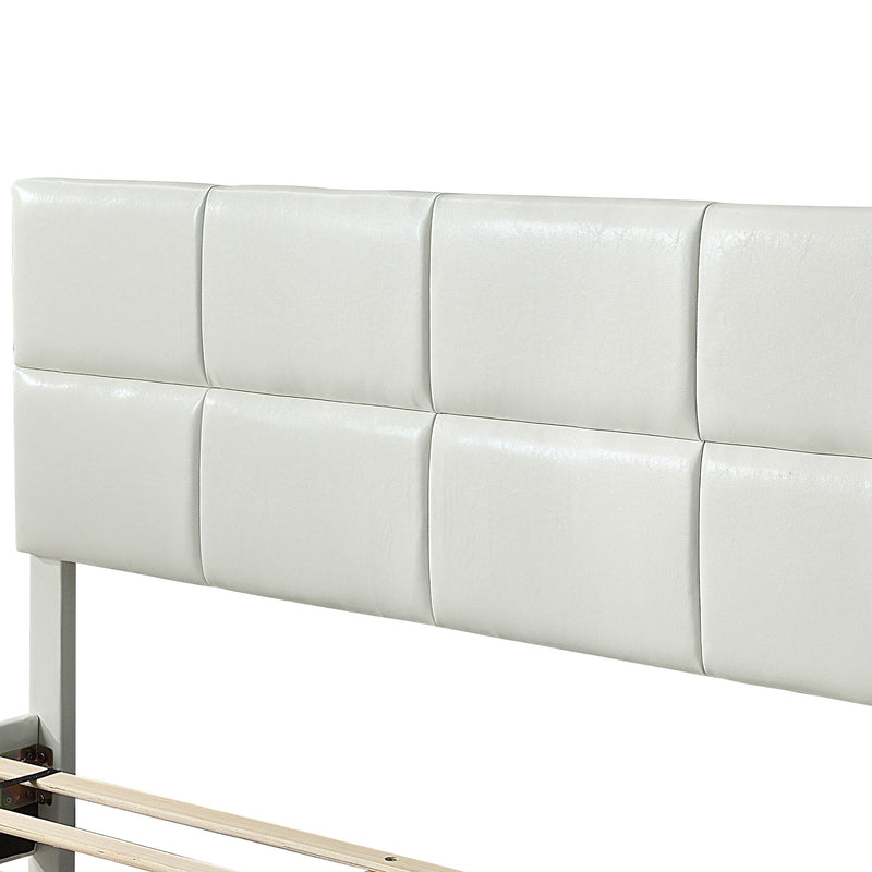 Left facing close up of the headboard on a contemporary white upholstered full bed with attached storage bench on a white background