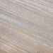 Close up swatch image of the light oak finish on a transitional light oak five-drawer chest with a metal base