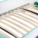 Angled close up of the support slats on a vintage teal peace bus novelty kid's platform bed