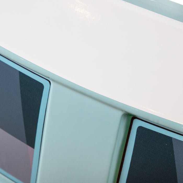 Left facing close up of a vintage teal peace bus novelty kid's platform bed
