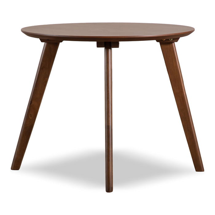 Front facing mid-century modern walnut finish round wood side table with splayed legs on a white background