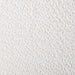 Swatch of the ivory boucle upholstery of amid-century modern walnut and ivory boucle accent armchair