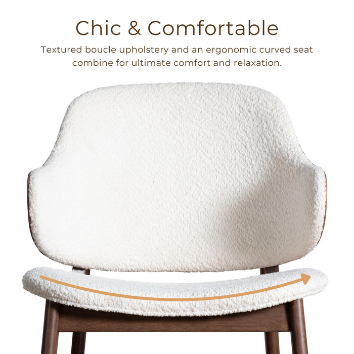 Informational image of the style and comfort of a mid-century modern walnut and ivory boucle accent armchair