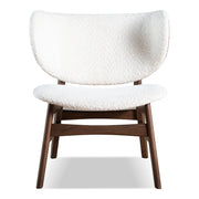 Front facing mid-century modern walnut and ivory boucle wingback accent chair on a white background