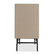 Front facing side view of a contemporary three-drawer light taupe and black buffet with a wine rack on a white background