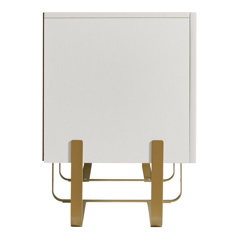 Front facing side view of a contemporary white and vintage gold fluted three-door TV stand on a white background
