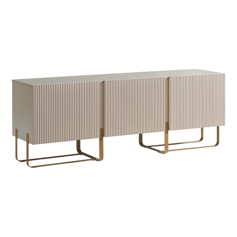 Right facing contemporary light taupe and vintage gold fluted three-door TV stand on a white background
