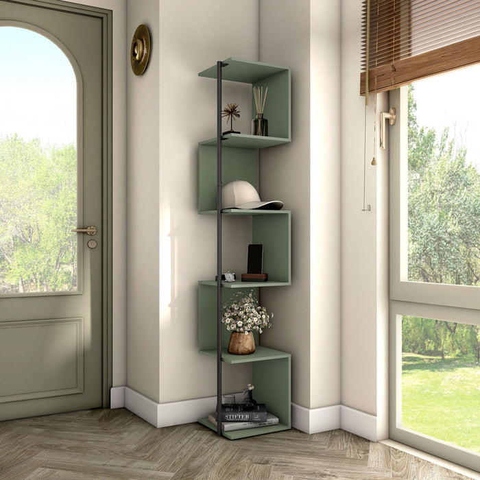 Right facing contemporary sage green and black five-shelf tiered corner bookcase in a room with accessories