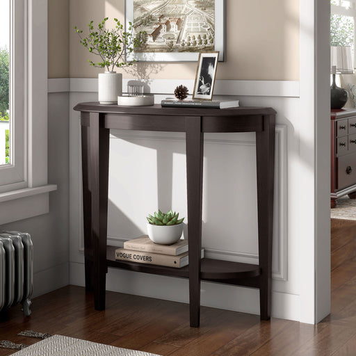 Left facing modern espresso demi-lune one-shelf console table in a room with accessories