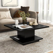 Right facing modern black square storage coffee table in a room with accessories
