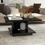Right facing modern black square storage coffee table with door open in a room with accessories