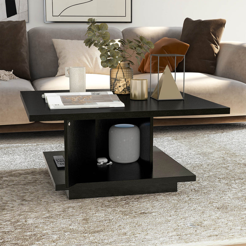 Right facing modern black square storage coffee table with door open in a room with accessories
