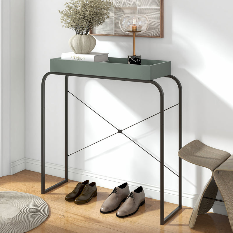 Left facing modern sage green and black tray style console table in a room with accessories
