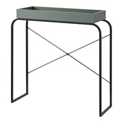 Left facing modern sage green and black tray style console table on a white background