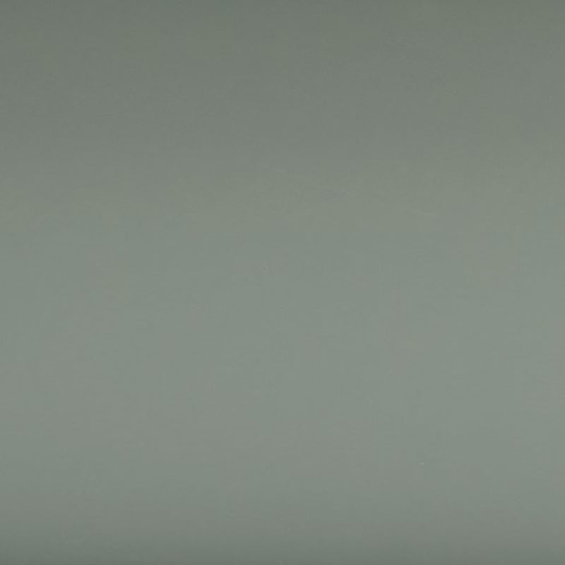 Swatch of the finish of a modern sage green and black tray style console table