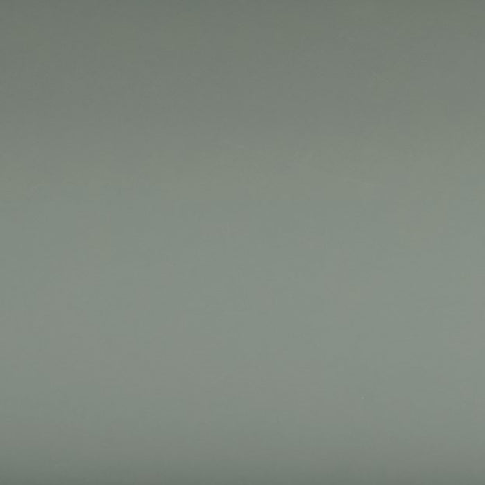 Swatch of the finish of a modern sage green and black tray style console table