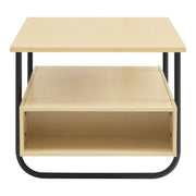 Front facing side view of a contemporary light maple and black multi-shelf coffee table with one drawer on a white background