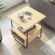 Right facing bird's eye view of a contemporary light maple and black two-shelf end table in a room with accessories