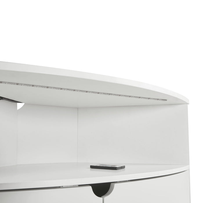 Right facing close up of a contemporary pure white two-door corner cabinet with LED lighting on a white background
