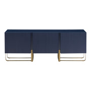 Front facing contemporary indigo blue and vintage gold fluted three-door TV stand on a white background