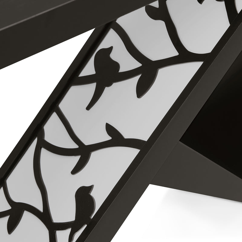 Left facing close up view of the shade panel on a contemporary black W-shaped console table with LED accent lighting and a bird pattern on a white background