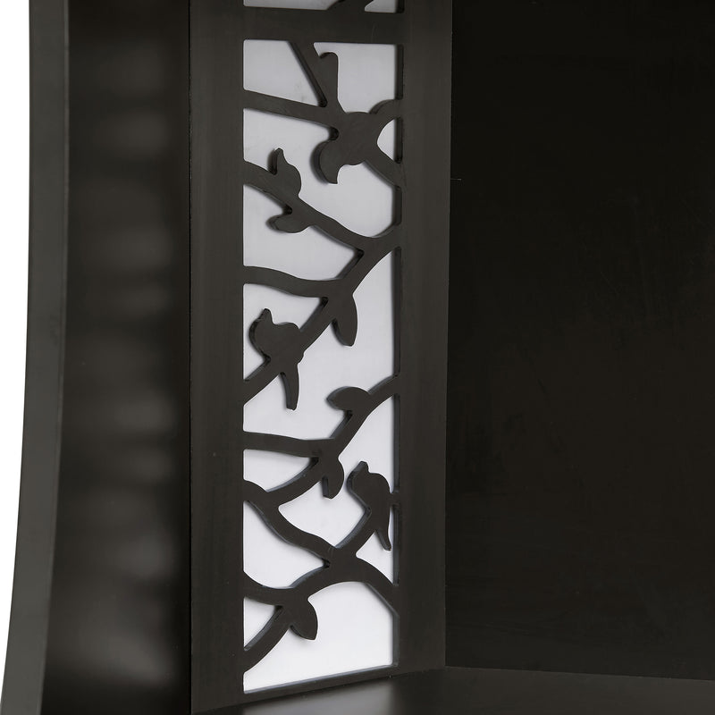 Right facing close up view of the decorative shade panel on a contemporary black five-shelf curved corner bookcase with LED lighting on a white background