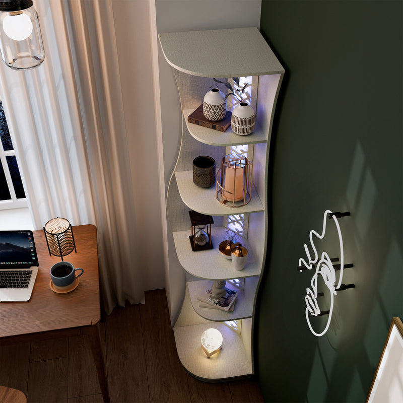 Left facing bird's eye view of a contemporary cream weave five-shelf curved corner bookcase with LED lighting in a room with accessories