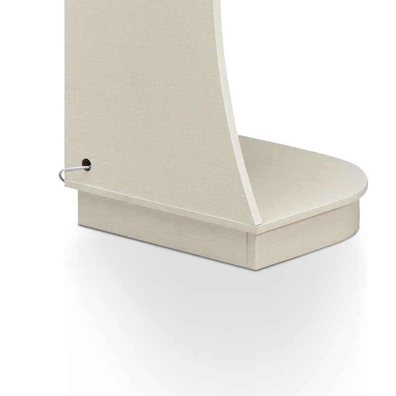 Right facing close up view of the base shelf and back of a contemporary cream weave five-shelf curved corner bookcase with LED lighting on a white background