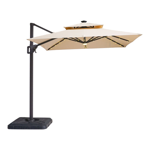 Front facing contemporary beige double-top square cantilever umbrella with base and LED lights on a white background