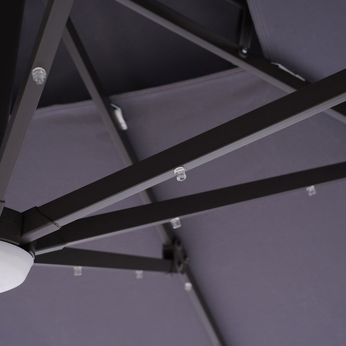 Close up of the LED lights and roof support of a contemporary grey double-top square cantilever umbrella with base and LED lights