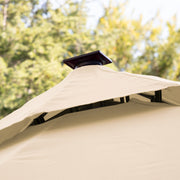 Close up of the vented double roof on a contemporary cantilever umbrella in tan fabric with solar LED lighting and carrying case