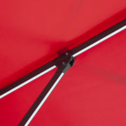 Close up of the support structure on a contemporary cantilever umbrella in red fabric with solar LED lighting and carrying case